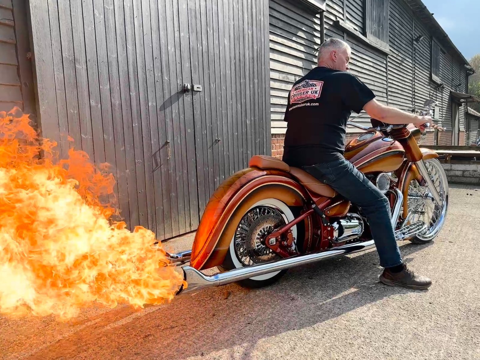 American Cruiser UK custom cruiser motorcycle with flame exhaust outside the Salisbury workshop