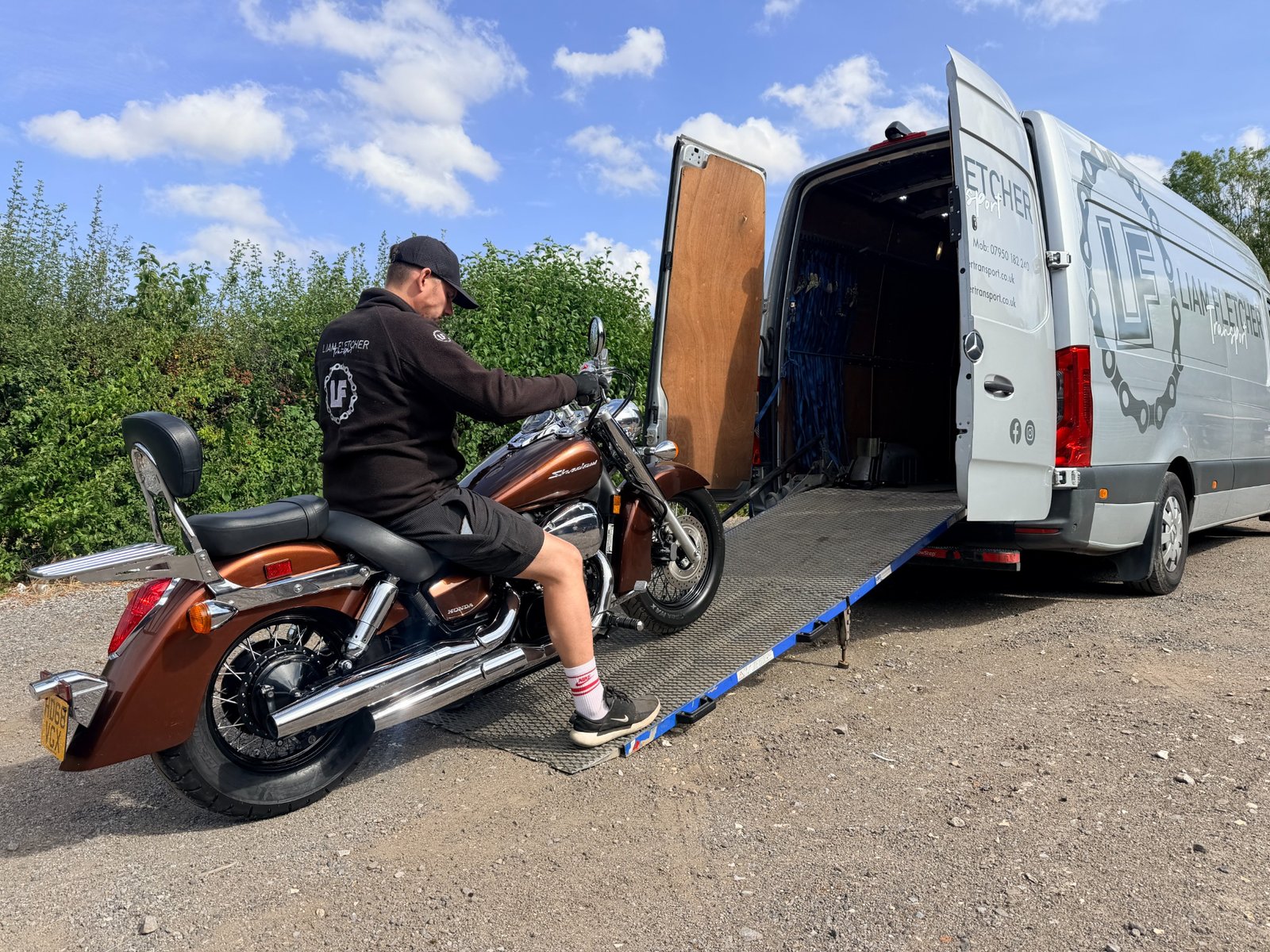 Motorcycle being loaded for specialist delivery